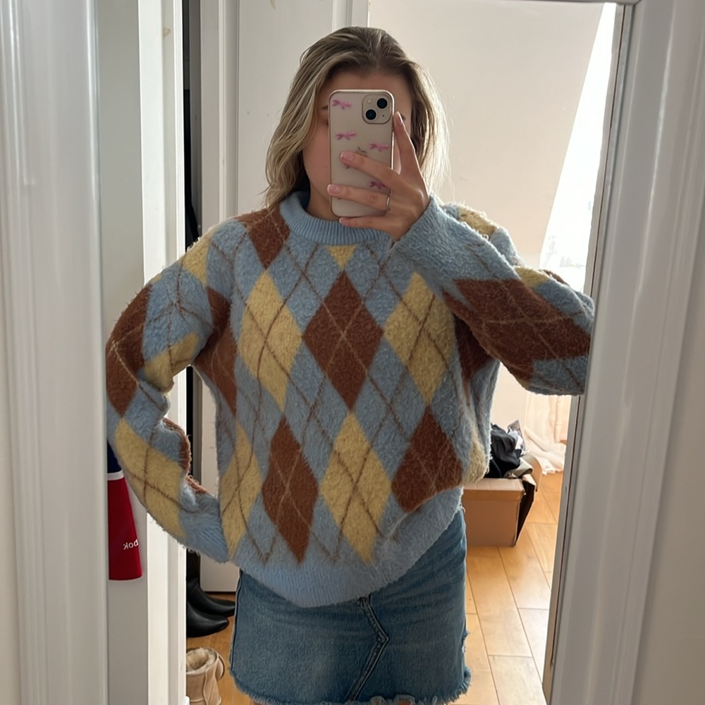 SIMONS light blue one-size sweater.